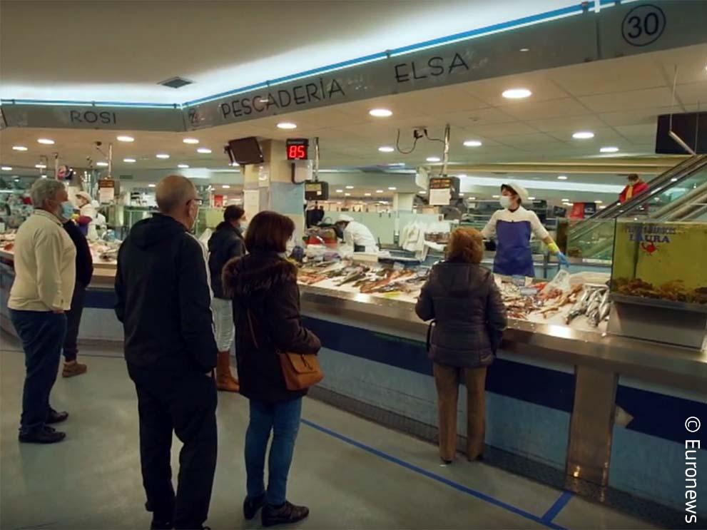 Customers in front of a fishmonger