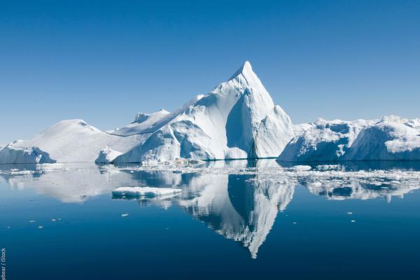 Icebergs drift in calm seas off the Greenland coast © Imagebear / iStock