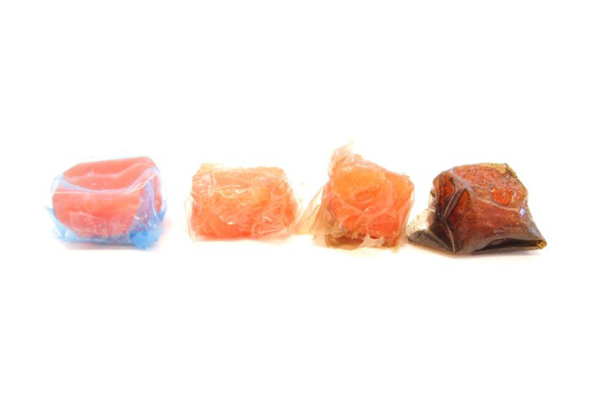 Seafood samples wrapped in traditional blue plastic film and different types of active biofilm